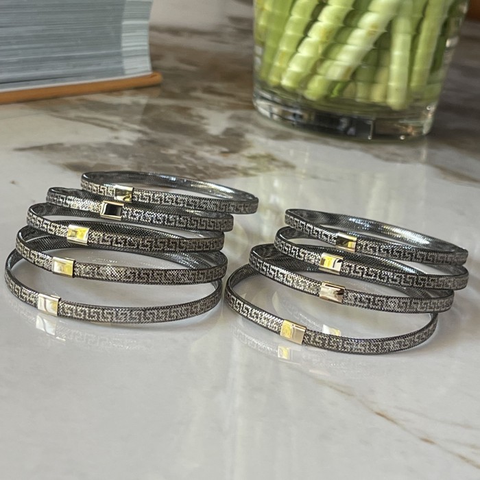 Bratara Versace Elastica din Aur Galben si Negru 14 Kt Bratara Versace Elastica din Aur Galben si Negru 14 Kt